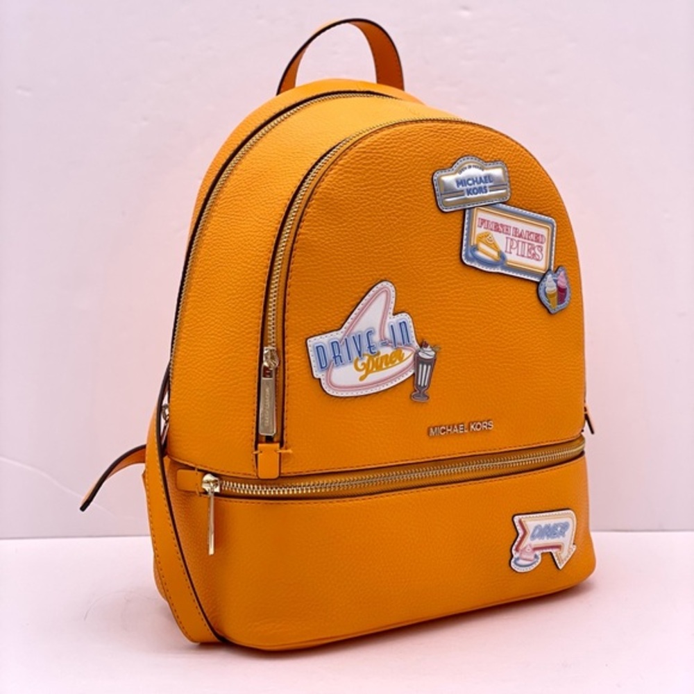 Michael Kors Vibrant Orange Backpack with Fun Patches